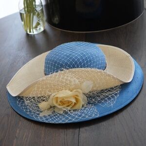 Elegant Blue and Cream derby or tea party Hat with Floral Accent